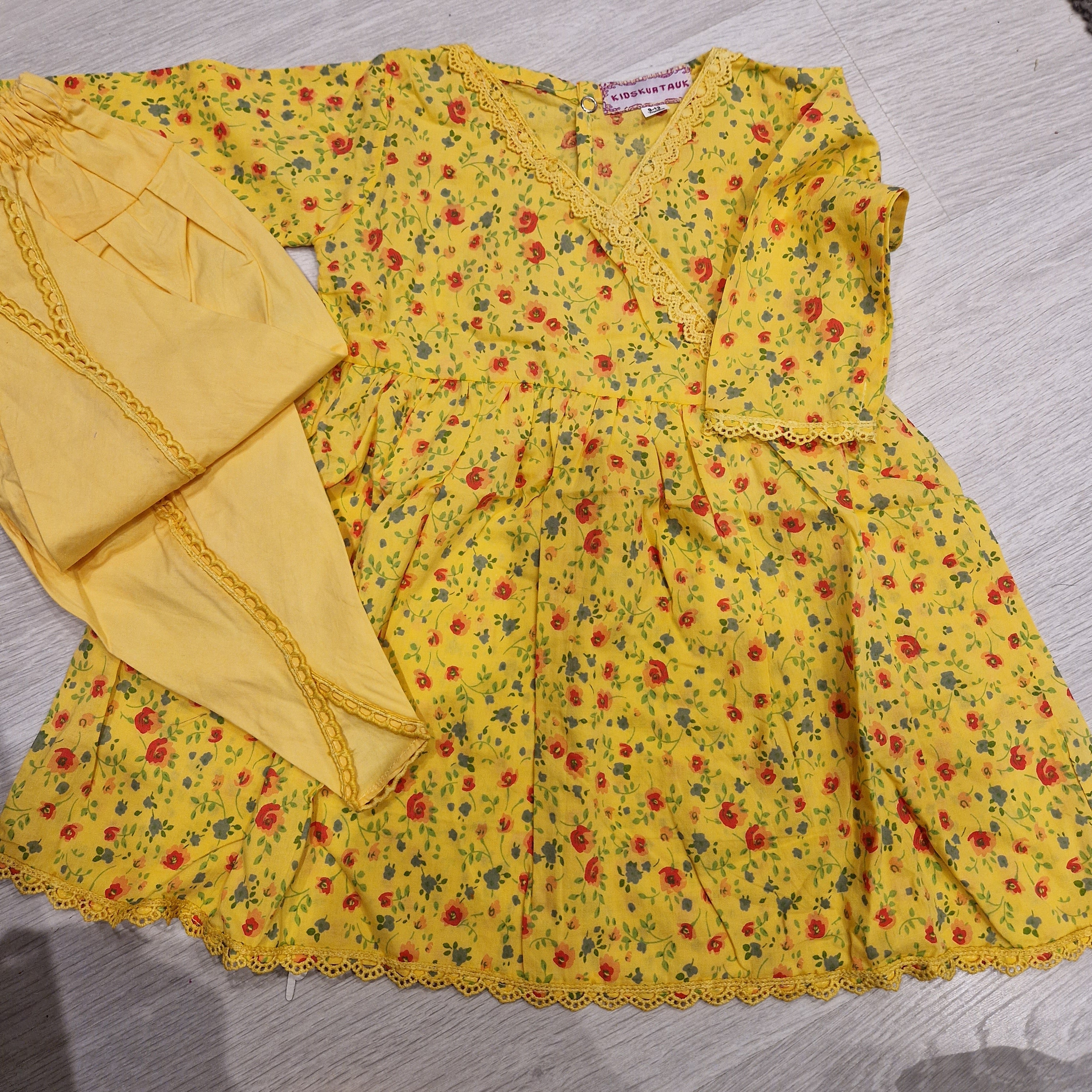 Yellow frock with tulip (bottoms are a bit small)